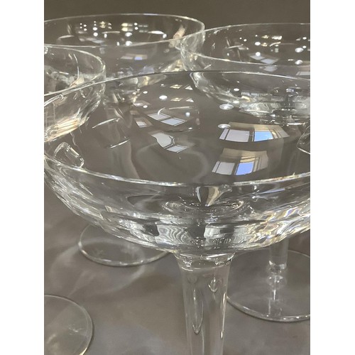 91 - A set of four Rocha for Waterford Champagne coups, 16cm (small chip to one rim)