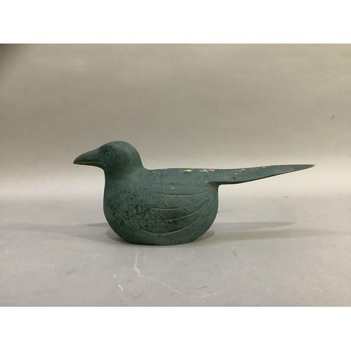 93 - A naive carving of a bird finished in sea green, 28cm long x 12cm high