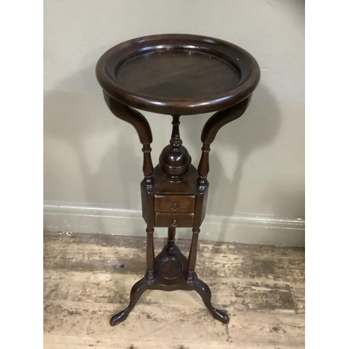 423 - A reproduction mahogany wig stand with two drawers