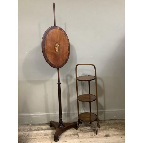 424 - A 1920s three tier folding cake stand together with a mahogany pole screen the oval banner cross ban... 