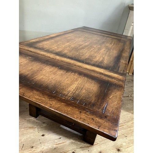 430 - A Titchmarsh and Goodwin oak drawer leaf extending dining table on turned legs joined by an 'H' stre... 