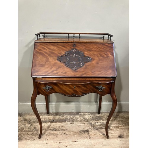 483 - A French style mahogany bureau having a gallery top, fall front , the interior fitted with small dra... 