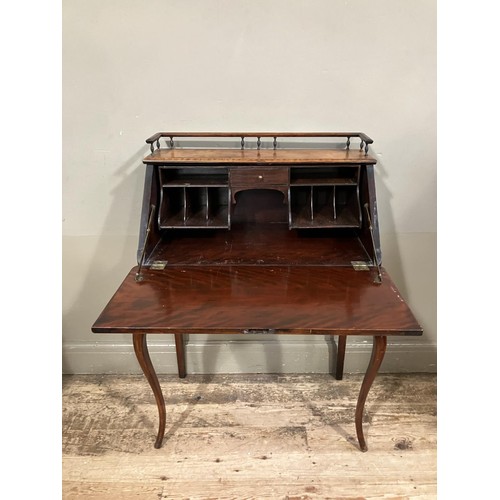 483 - A French style mahogany bureau having a gallery top, fall front , the interior fitted with small dra... 