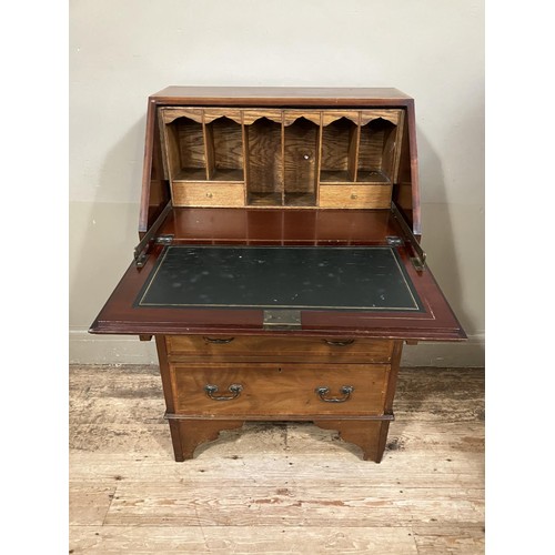 489 - An Edwardian inlaid bureau having fall front over three graduated drawers and bracket feet, 61cm wid... 