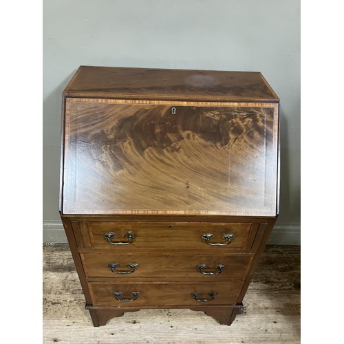 489 - An Edwardian inlaid bureau having fall front over three graduated drawers and bracket feet, 61cm wid... 