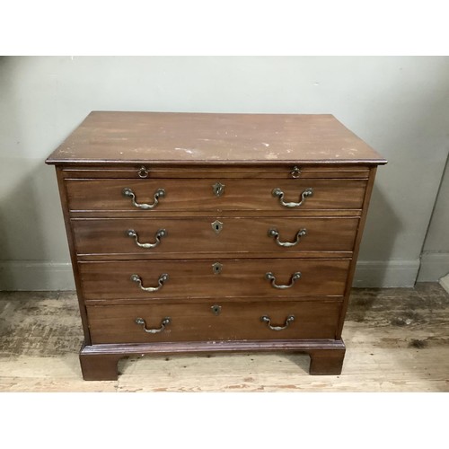 491 - A mahogany bachelor's chest of four graduated drawers and on bracket feet, 92cm wide, 82cm high