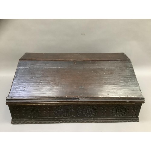 507 - An oak bible box with gouge cut detailing and carved floret front, carved 1670, later converted to a... 