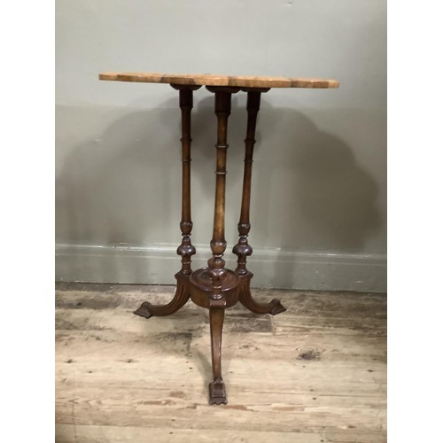 514 - A Victorian figured walnut occasional table, circular with scalloped rim, inlaid to the centre with ... 