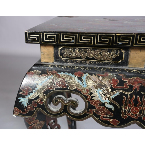 488 - A Chinese black lacquered table or stand, Qing, the rectangular top painted in iron red, green blue ... 