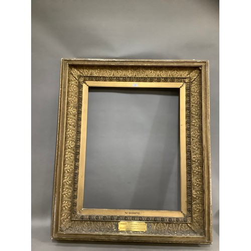 474 - A 19th century giltwood picture frame with projecting moulding, acanthus leaf surround and egg and d... 