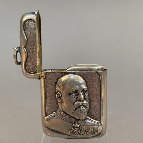 63 - An Edward VII commemorative base metal vesta embossed with a head and shoulders portrait of Edward, ... 