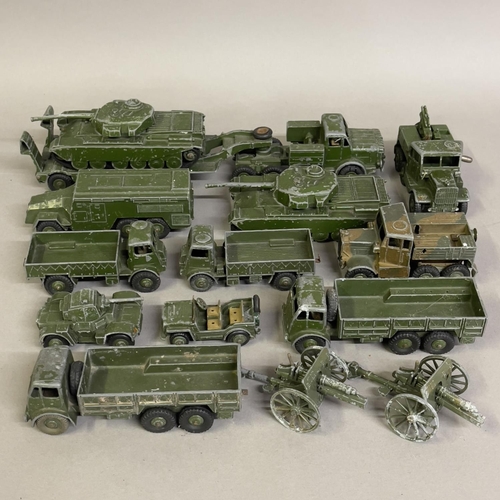 97 - A collection of 15 play worn Dinky Toys and Supertoys military vehicles including two 651 Centurion ... 