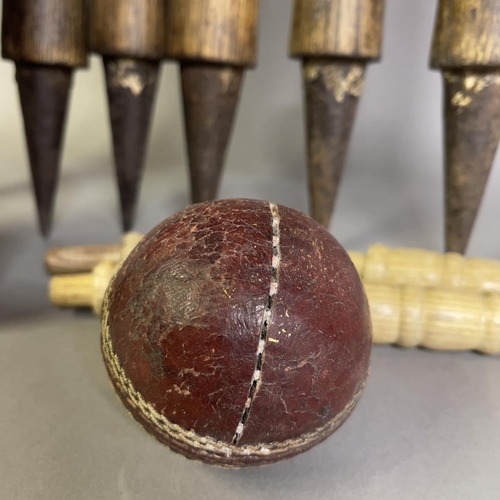 94 - A Fred Milner ‘Don Bradman’ cricket bat, along with a set of six stumps, four bails and a ball