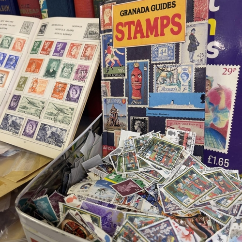 178 - A large collection of stamps and philatelic ephemera consisting of a good number of albums, tins ful... 