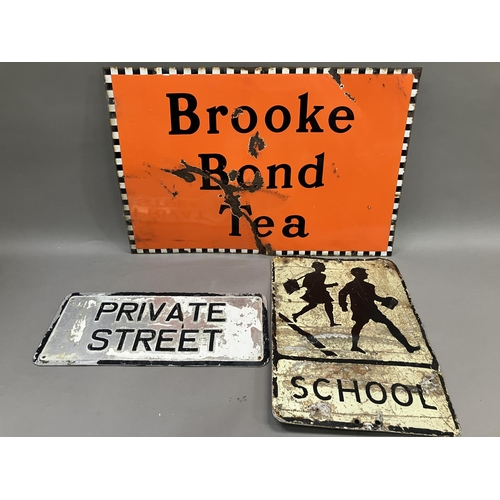 61B - A Brooke Bond Tea enamel sign in orange, black and white, 76cm x 51cm together with a white enamel a... 