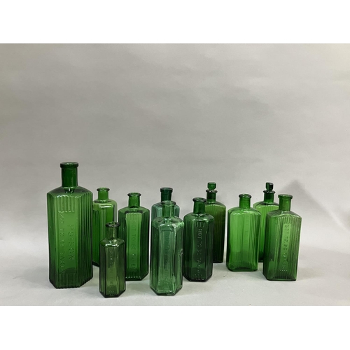 86 - A collection of eleven green glass poison bottles (two with stoppers), 12.5cm to 22.5cm high