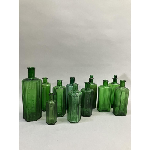 86 - A collection of eleven green glass poison bottles (two with stoppers), 12.5cm to 22.5cm high