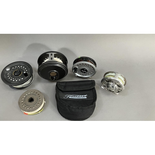 258 - Four fly fishing reels to include, two Magnum 200D, one Romfly with extra reel, one Pflueger