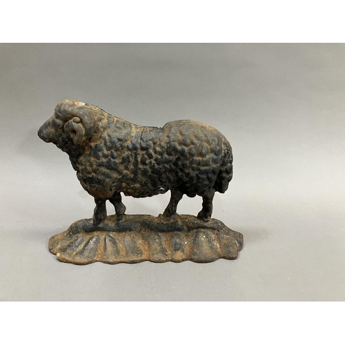 60 - A Victorian cast iron door stop in the form of a sheep, 25cm wide x 19cm high