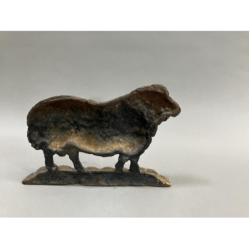 60 - A Victorian cast iron door stop in the form of a sheep, 25cm wide x 19cm high