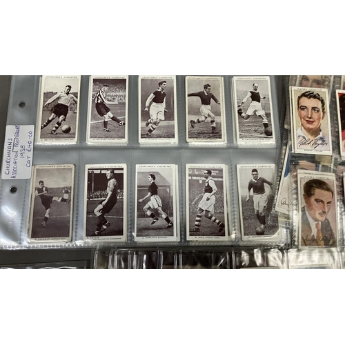 161 - Forty cigarette card sets and part sets, in plastic sleeves including Player's Association Cup Winne... 