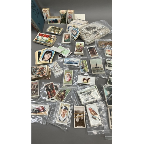 162 - A quantity of A&BC, Wills, Players and other cigarette cards together with cigarette card reference ... 