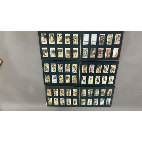 163 - Three Wills' cigarette card albums containing a mixture of cards and two Churchman's albums with Ass... 