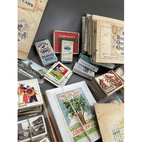 166 - A large quantity of cigarette and trade cards in albums and loose (1000+)