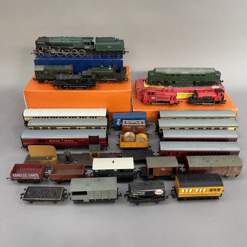 100 - A collection of Hornby and Hornby Dublo locomotives and rolling stock, including a 92220 Evening Sta... 