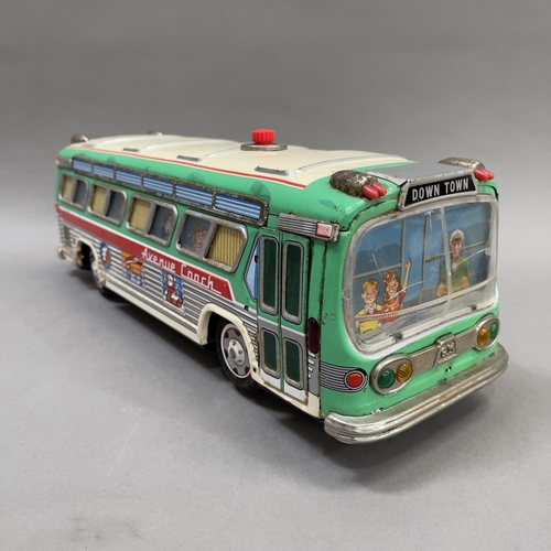 107 - A 1950s Yonezawa ‘Avenue Coach’ tin plate model measuring 42cm long, being battery operated and in w... 