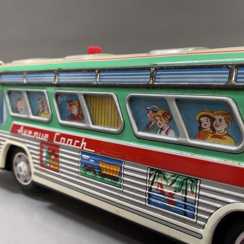 107 - A 1950s Yonezawa ‘Avenue Coach’ tin plate model measuring 42cm long, being battery operated and in w... 