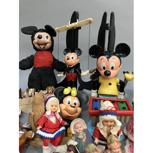 117 - A collection of Walt Disney toys, including a Selco Mickey Mouse, a Burbank Toys pull string Mickey ... 