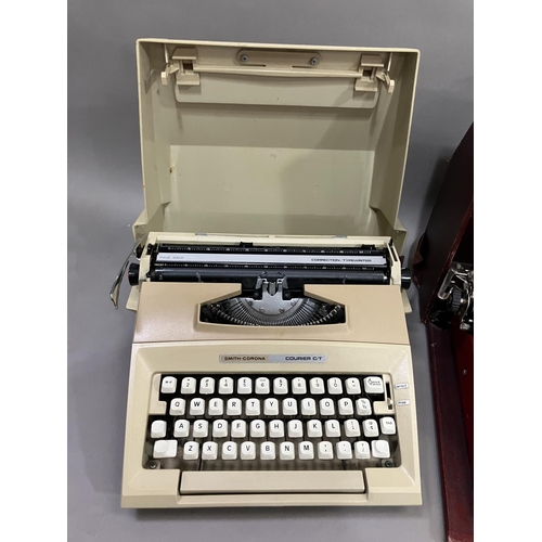 52 - An Olympia Splendid 66 portable typewriter, a Royal portable typewriter and a Smith-Corona Courier p... 