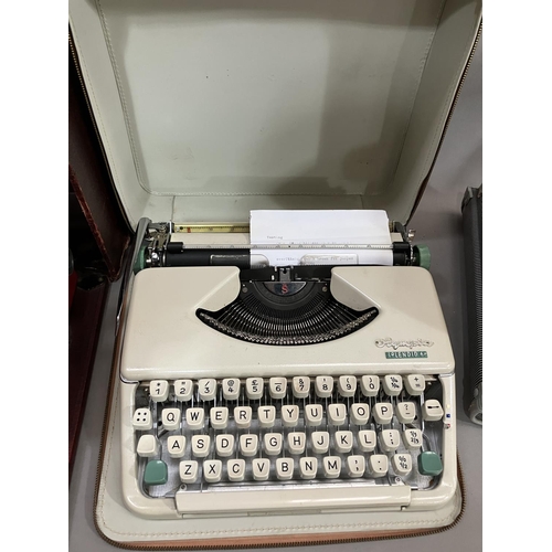 52 - An Olympia Splendid 66 portable typewriter, a Royal portable typewriter and a Smith-Corona Courier p... 