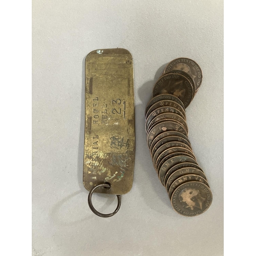 64 - An Edwardian Imperial Hotel brass room key together with twenty 1919 H pennies