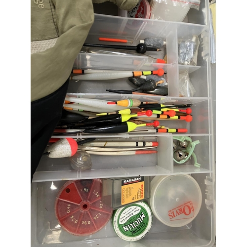 259 - Fishing: a quantity of fishing line and weights floats, salmon and sea spinners, assorted floats hea... 