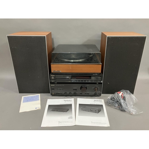 43 - A Technics SU-V460 stereo integrated amplifier, a Technics SL-P200 CD Player, a Garrard AP 76 turnta... 