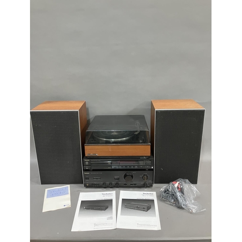 43 - A Technics SU-V460 stereo integrated amplifier, a Technics SL-P200 CD Player, a Garrard AP 76 turnta... 