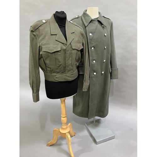 19 - A Belgian 1967 Military battle dress blouse, PVBA Begetex together with a Belgian Military great coa... 