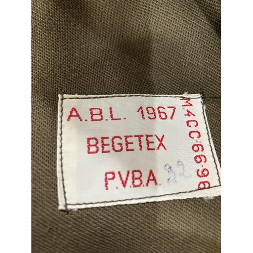 19 - A Belgian 1967 Military battle dress blouse, PVBA Begetex together with a Belgian Military great coa... 