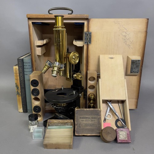 39 - An early 20th century cased Carl Zeiss Jena microscope with three Zeiss lenses, four Zeiss eyepieces... 