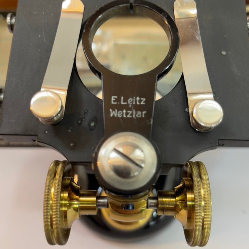 39B - A boxed Leitz Wetzlar inspection scope, with assorted magnification eyepieces, a boxed brass eyepiec... 