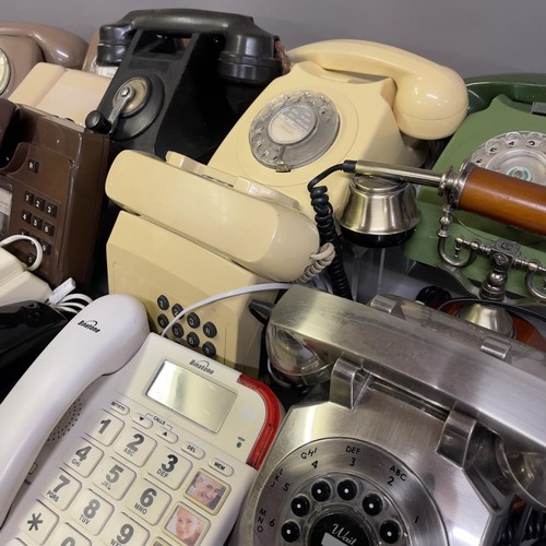 41 - A quantity of rotary dial and push button BT telephones from the 1970s, 1980s and 1990s, along with ... 