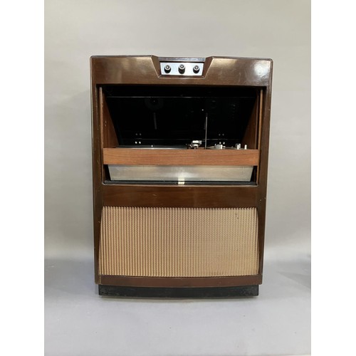 48 - A 1960s Bush Arena music centre with direct drive Lenco B55 turntable, along with a pair of Sanyo lo... 