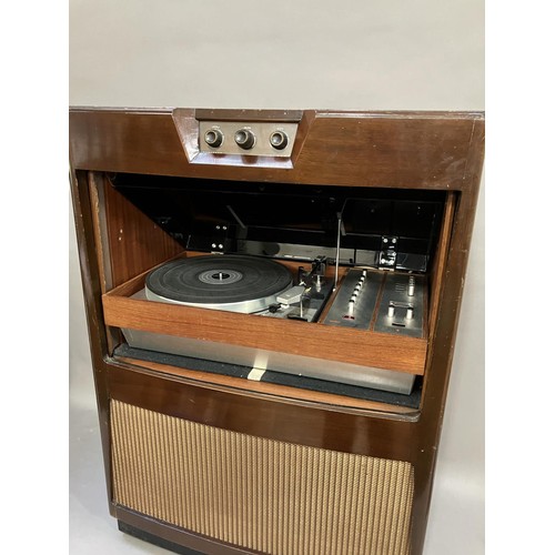 48 - A 1960s Bush Arena music centre with direct drive Lenco B55 turntable, along with a pair of Sanyo lo... 