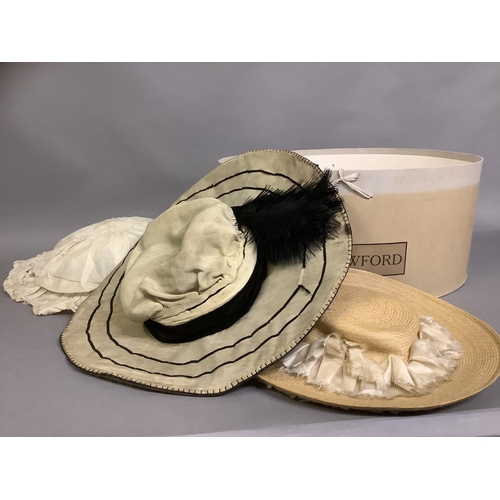 298 - Three stylish Edwardian hats, large, the first in cream cotton, the brim wired, pleated and frilled,... 