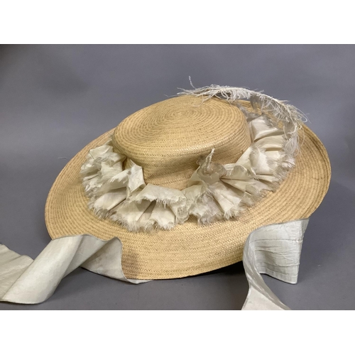 298 - Three stylish Edwardian hats, large, the first in cream cotton, the brim wired, pleated and frilled,... 