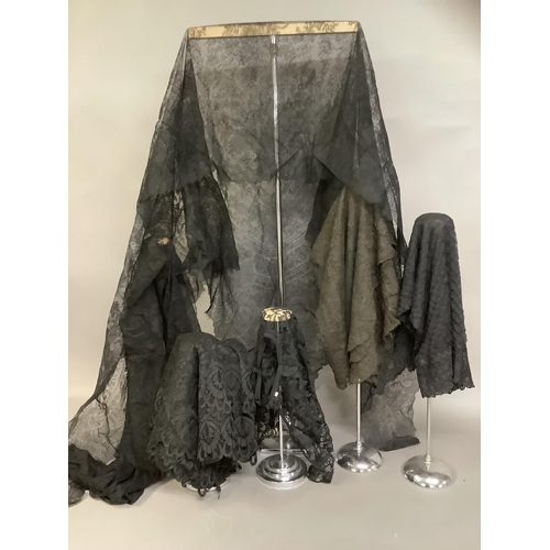 268 - Victorian lace, black: consisting of a fine handmade triangular shawl, floral design; a second trian... 