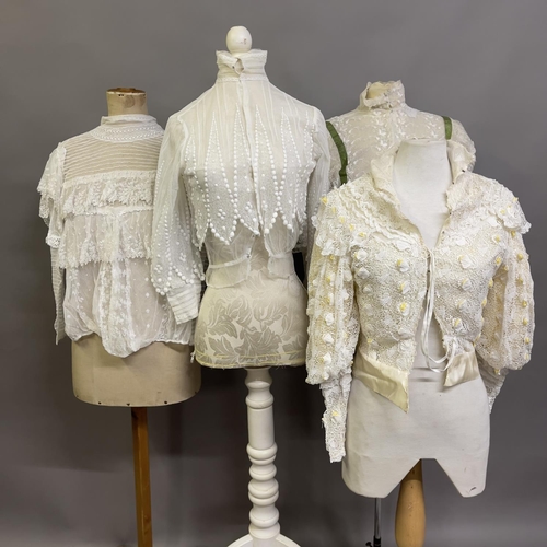 317 - Edwardian style blouses: four cream or white blouses, all with high necks, different styles of origi... 