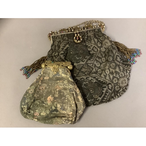 235 - Two early 20th century lamé evening bags, the first with elaborate metal frame inset with stones, ch... 